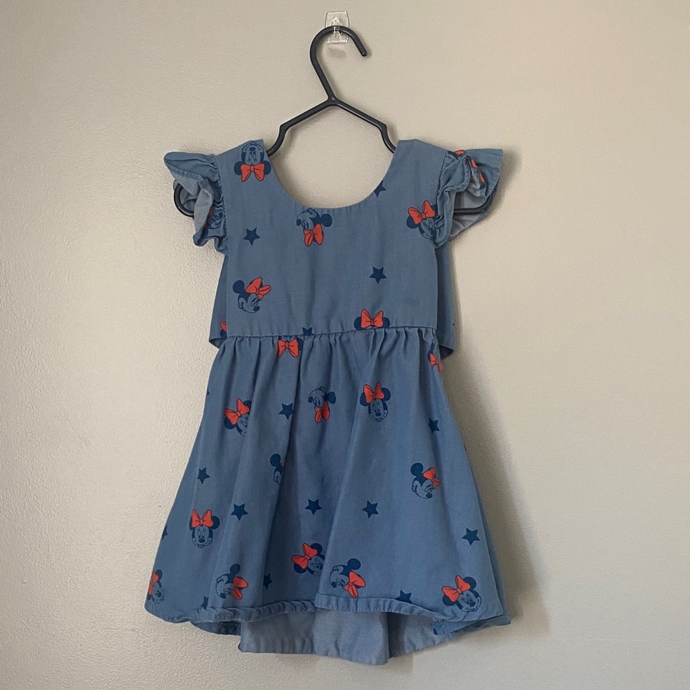 Disney Minnie Mouse dress featuring red bows and blue stars